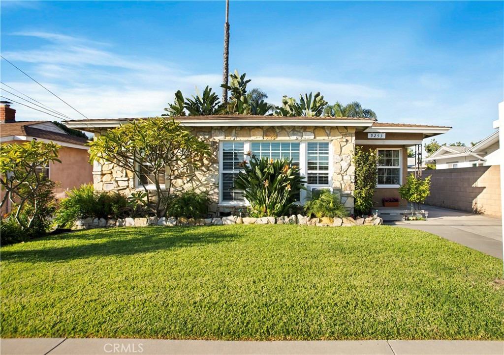 Experience relaxation and style in this beautifully maintained 3 bedroom, 1 bath home located in a highly desirable neighborhood. Step inside and you’re welcomed by warm wood flooring that flows throughout the home, leading into a bright, open living room. A large picture window fills the space with natural light, creating a comfortable and inviting atmosphere.
The kitchen offers plenty of cabinetry and counter space, making it perfect for both everyday living and entertaining. Each bedroom is generously sized, providing comfort and ample storage.
Outside, a long driveway offers plenty of parking and leads to a detached two-car garage. The expansive 10,000 sq ft lot is a rare find, ideal for outdoor gatherings, gardening, or potential ADU additions. Surrounded by mature greenery and a variety of fruit trees, the backyard feels like your own private retreat, complete with a storage shed for extra convenience.
Conveniently located near the 91 freeway, within walking distance to local schools, and just minutes from Lakewood Mall, this home perfectly balances charm, space, and location. Don’t miss your chance to make it yours.