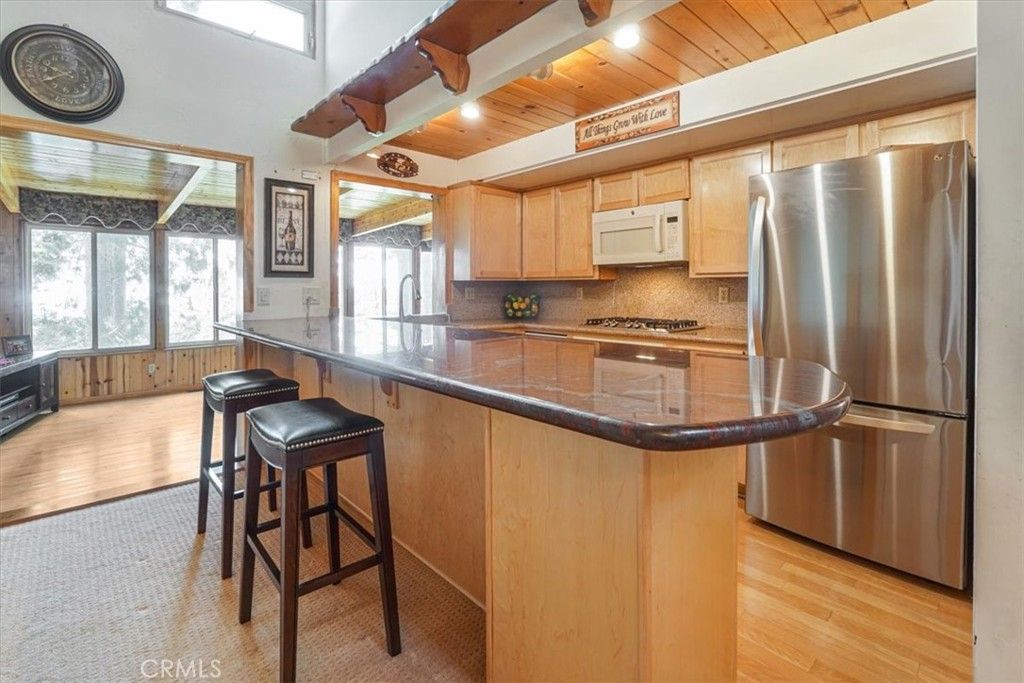 Photo of 1954 Nob Hill Drive, Running Springs, CA 92382 (MLS # IV25242711)