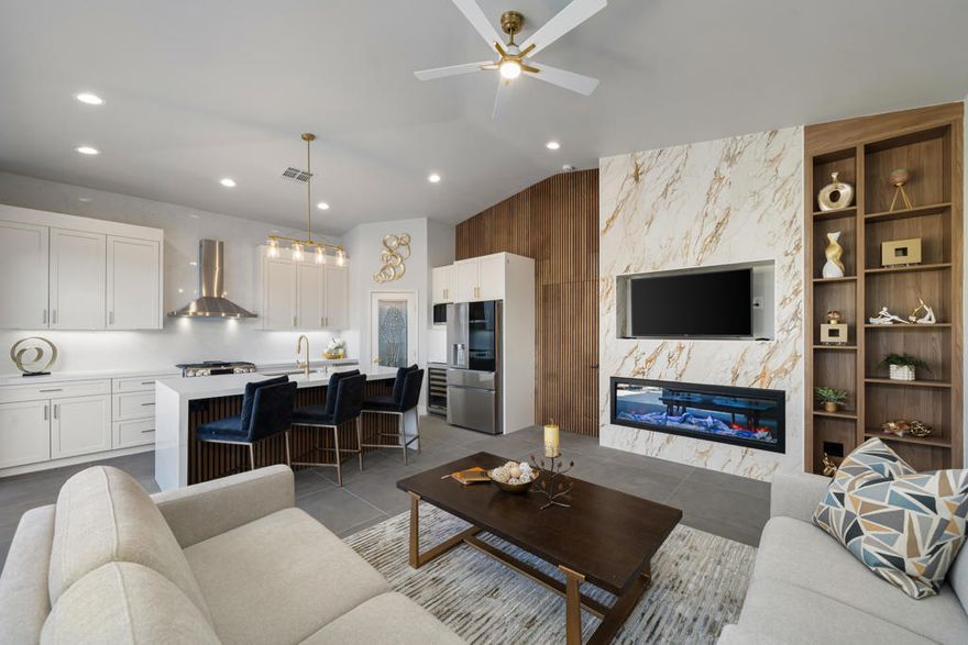 #71 DESERT SHORES RESORTGorgeous Remodeled Villa with 2 Suites at Desert Shores Motorcoach Resort.VILLA FEATURESPlan 30 with Guest Suite ExtensionMain Living Space:               830 Sq. Ft.Guest Suite:                          490 Sq. Ft.Total Living Space:            1,320 Sq. Ft.1.5 Stall Car Garage:            370 Sq. Ft.TOTAL STRUCTURE:          1,690 Sq. Ft.Primary Retreat: Spacious room with remodeled Ensuite, Walk-in Closet & 60' of Linen Cabinets.Guest Suite Addition:Bring the kids and grandkids with this newer-built suite that boasts a Living Room and Retreat with Bathroom and Wardrobe Closet.ROOMS:Kitchen/Great Room2 Retreats with Bathrooms & Closets.Laundry Space.INTERIOR FEATURESBeautifully remodeled with:New Kitchen with:Quality CabinetryQuartz Counters and Waterfall Sides and Counter to Ceiling Wall Splash.New AppliancesNew, Large-Format TileNew Electric Fireplace.Acoustic Wood-Slat Wall (w/ hidden door)Bathroom Remodel with:New Cabinets with Dual SinksLinen CabinetsSpacious ShowerCloset CabinetryOpen Great Room with Wine Chiller, Cozy Fireplace, and stacking Glass Sliders to the Patio.  Other features include electric slider door drapery, and wood-shutters on windows.EXTERIOR FEATURESLake, Fountain and Mountain Views.Epic Yard offers a Freeform Pool with Boulder Waterfalls, swim-up bar seating, and a Sheer-Waterfall Grotto Spa.Paver Stone Driveway and Tuscan Cream Marble Decking with Natural Gas Tiki Torches.Covered Outdoor Living and Dining Areas and Barbecue Bar + Retractable Awning. Eldorado Stone Exterior Trim.Rolling metal Shutters on slider doors.Low-maintenance front yard with a mixtureof artificial Turf and Desert Landscaping.MISCELLANEOUSExposure/Location:Western Back YardPrivate, Lake Two LocationFURNISHED? UnfurnishedGARAGE FEATURES:1.5 Stall Garage with Swiss Trax Floors.Split-system Temperature Control.W/D Hookups.