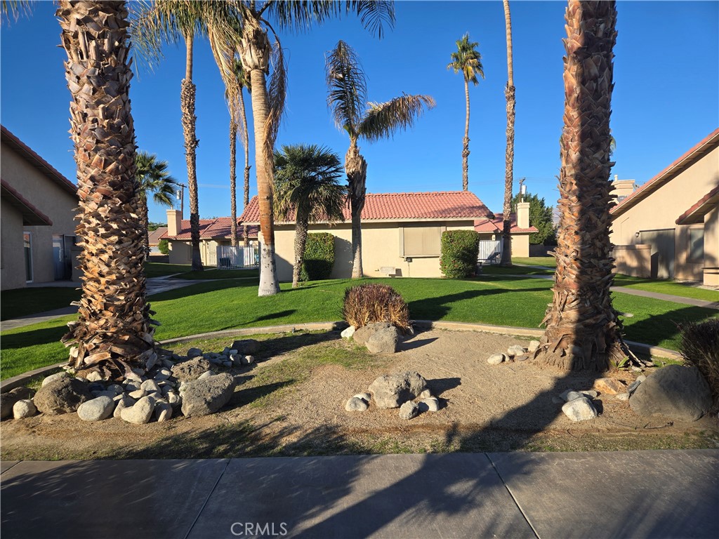 Fully remodeled Two-bedroom units with fireplace and 1 Car Garage. (additional parking on site) Come and see these nicely appointed single story units. The home opens up with new flooring throughout with a roomy family room and fireplace for these cool winter evenings. The home is Freshly painted throughout with a modern appeal. A large kitchen with lots of cabinet and counter space, modern appliances including Refrigerator, dishwasher, microwave, garbage disposal await the chief in the family. The large roomy bedrooms with lots of closet space has plenty of room for your wardrobe. The community pool offers summer fun and a quick cool down for these hot days. The Onsite laundry facility is fast and convenient.
There are large grassy areas for kids to play. This really is a great location with a friendly atmosphere. Sure to go fast, call for a private tour.