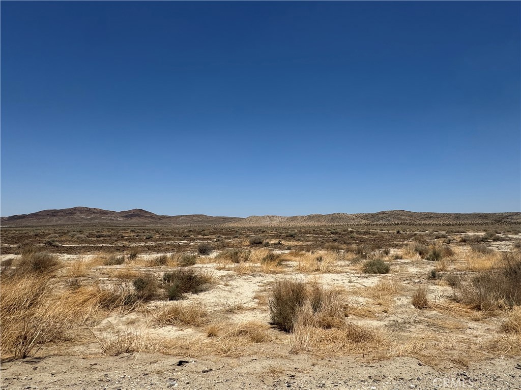 5 acres vacant residential land.