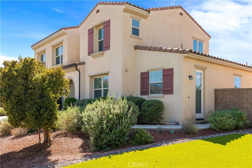 This stunning multigenerational home offers 5 bedrooms, 3.5 bathrooms, and a spacious bonus room, including an attached Multi-Gen suite with its own private entrance. The Multi-Gen suite is thoughtfully designed with a living room, spacious bedroom, kitchenette, large walk-in closet, and stackable washer and dryer—ideal for extended family, guests, or rental potential. The heart of the main home is an upgraded kitchen featuring stainless steel appliances, double ovens, a large granite island, walk-in pantry, and multiple built-ins, all seamlessly connected to the open floorplan and spacious family room. Expansive patio doors lead to a California room overlooking the large backyard, complete with a kids’ play structure and plenty of room to entertain. Energy efficiency is built in with paid solar, while a tandem 3-car garage provides ample parking and storage. Residents also enjoy access to outstanding community amenities including multiple pools, spas, picnic areas, and sports parks. Conveniently located near shopping, freeways, and top-rated schools, this home blends comfort, functionality, and resort-style living.