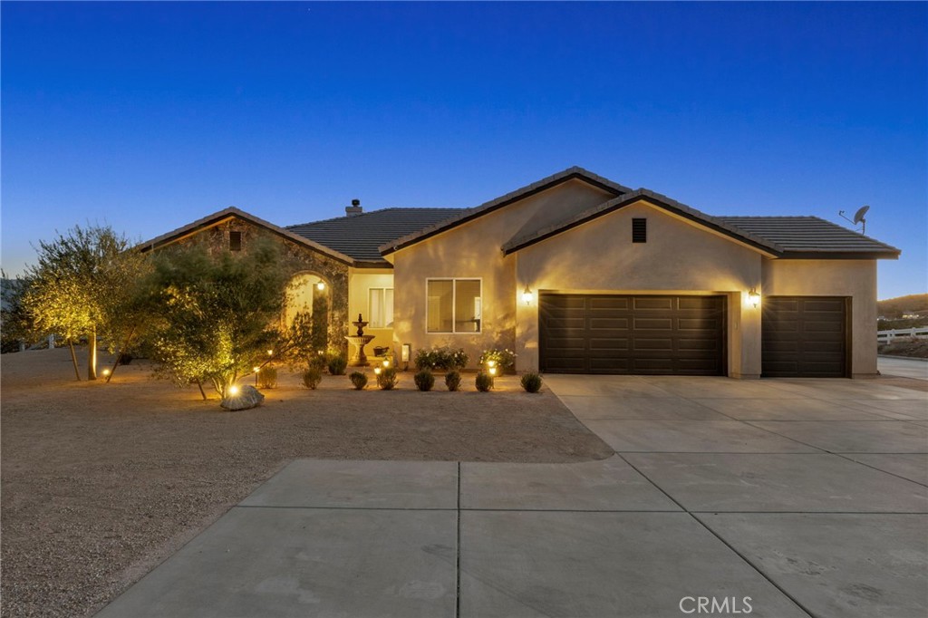 Luxury Meets Privacy at the Top of Star Point Ranch!
Panoramic views! Welcome to your dream retreat in Acton, CA — a stunning 5-bedroom, 3-bath estate located in the exclusive Star Point Ranch community. Set on 20 private and fenced acres, this 2,823 sq ft home offers the perfect blend of luxury, seclusion, and breathtaking views.
At the end of a long, gated driveway, perched above the neighborhood, this beautifully upgraded home boasts a truly elevated lifestyle. Enjoy an unmatched location, a resort-style infinity pool, paid solar system, solar pool water heater and a fully landscaped property designed for comfort and elegance. The exterior of the house features a custom smooth plaster finish. Room for a large shop with 50 amp power service for RV hookup.
Inside, you'll find spacious living areas, modern finishes and thoughtful upgrades throughout. The upgraded kitchen features high end Kitchen Aid appliances and finishes. Custom cabinetry. Open floor plan off kitchen to main living area with fireplace and faux beamed ceiling The primary retreat features a fireplace, exterior entry and the ensuite bathroom offers separate shower and soaking tub with ample closet space. Large formal dining room and oversized living room with fireplace. Step outside to your outdoor kitchen oasis, complete with a built-in BBQ, smoker and wood-fired pizza oven and refrigerator — perfect for entertaining under the stars. Whether you're lounging
poolside, enjoying the sunsets, or hosting gatherings, this home offers peaceful privacy without sacrificing convenience — just minutes from the freeway for an easy commute. Luxury. Privacy. Location. This is California living at its finest. Come for a visit. Stay for a lifetime. Welcome home!