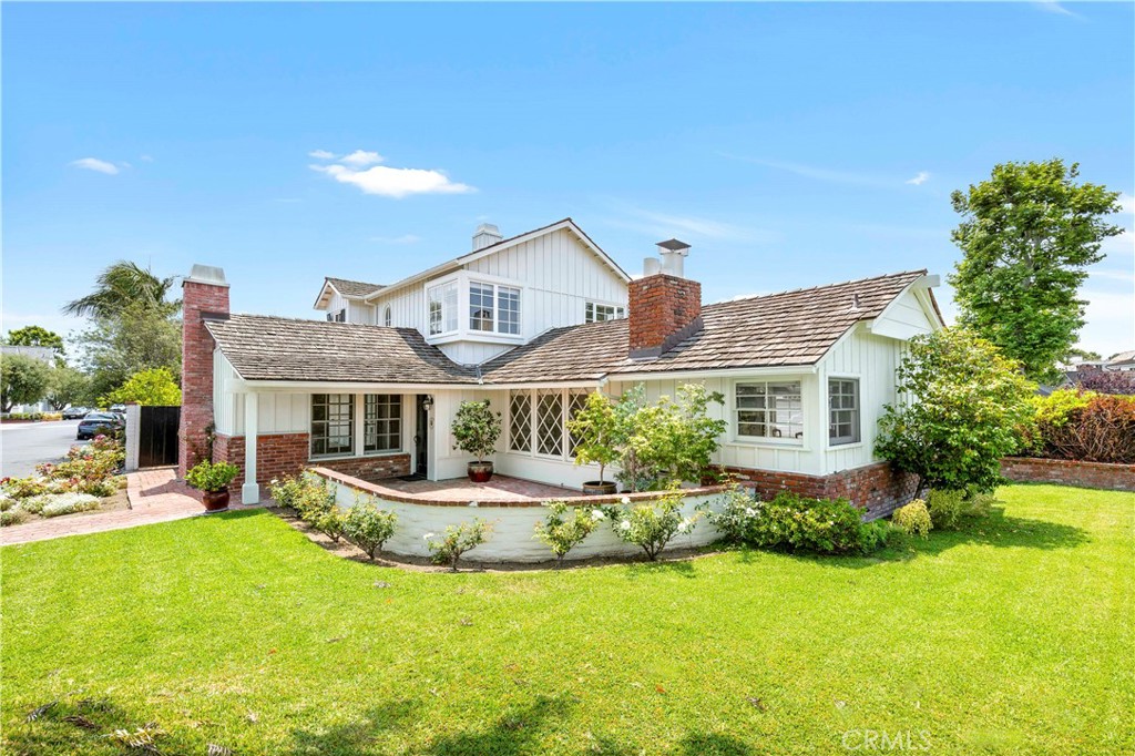 Charming Bayshores Residence on a rare oversized corner lot. Situated on an expansive corner lot in the exclusive community of Bayshores. This inviting 3 bedroom, 3 bath home blends the timeless character with coastal comfort, large brick patio off living room with an additional front patio. Residing in Bayshores, owners enjoy two private beaches overlooking the Newport Bay, a marina, beach volleyball, children’s park and access to the Balboa Bay Club, offering the ultimate Newport Beach lifestyle.