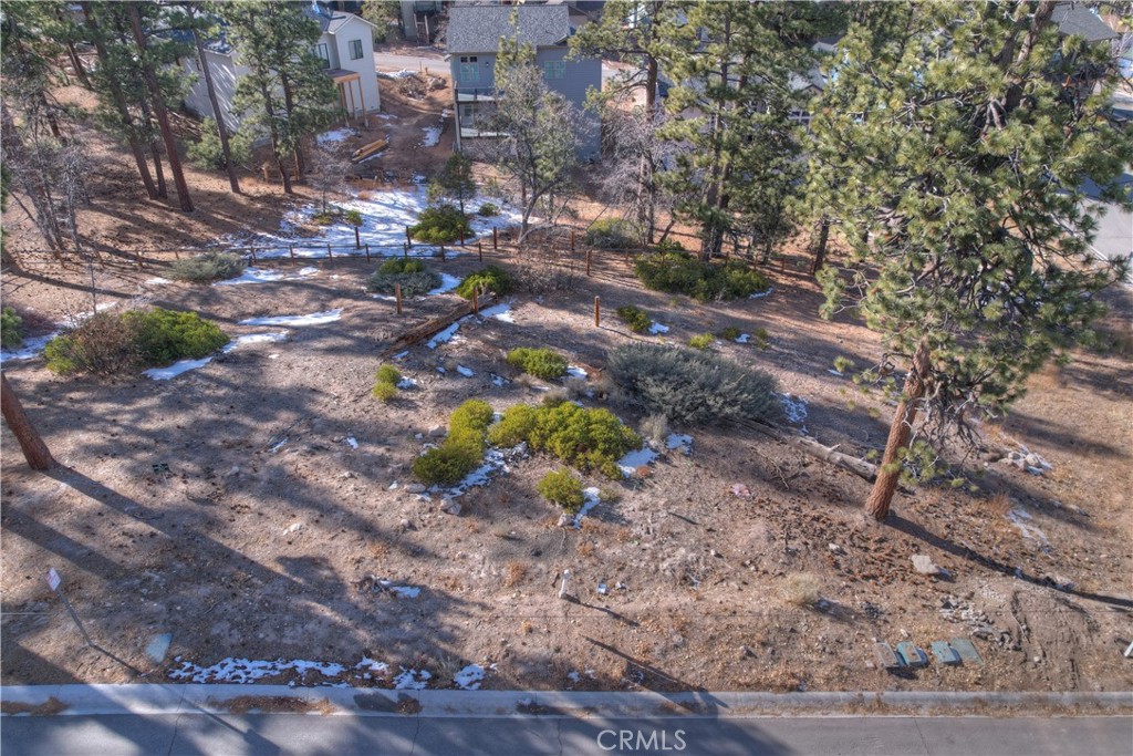 Surveyed 7,269 sq. ft. cul-de-sac lot with utilities and City-approved plans in The Pines, Big Bear Lake’s premier new subdivision. Plans are available upon request for either a 2,254 or 4,100 sq. ft. home, and financing is available. Lot is adjacent to the community's greenbelt/conservation area.
The Pines is ideally located within walking distance to the Village, lake, hiking trails, Alpine Slide, and more—offering unparalleled convenience and access to outdoor adventure. Backing directly to the National Forest and featuring two serene conservation areas, this community perfectly blends modern living with the tranquility of the mountains.