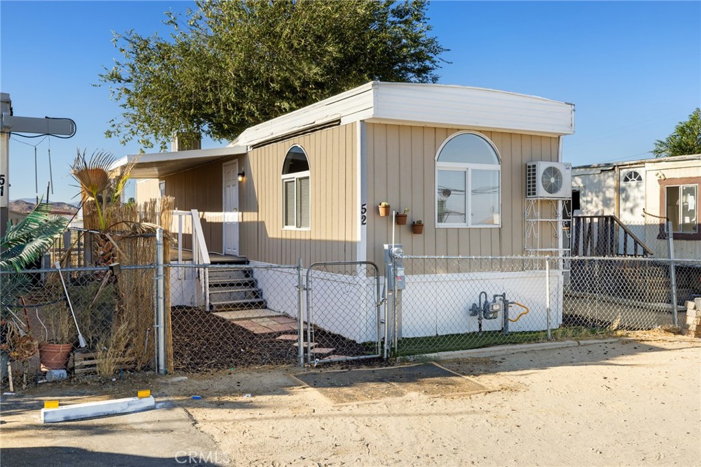Welcome to 5335 W Rosamond Blvd #52, a beautifully upgraded 2-bedroom, 2-bathroom manufactured home located in the heart of Rosamond. This inviting residence offers a comfortable and spacious layout, ideal for those seeking both convenience and style. Step inside to discover brand-new flooring that adds a fresh, modern touch to every room. The home also features recently installed privacy shades, creating a serene and cozy environment while offering enhanced comfort and light control. Whether you're relaxing in the open living area, preparing meals in the well-appointed kitchen, or unwinding in one of the two generously sized bedrooms, you'll appreciate the thoughtful upgrades and functional layout. Nestled in a well-maintained community, this home offers a peaceful lifestyle while still being conveniently close to shopping, dining, schools, and freeway access. A wonderful opportunity for first-time buyers, downsizers, or anyone looking for a move-in ready home with tasteful improvements.