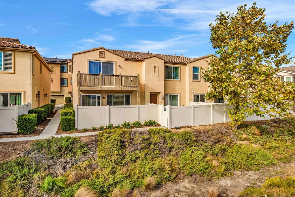 This elegant two-story middle unit townhouse perfectly combines style, comfort, and functionality. The open-concept kitchen is ideal for both daily living and entertaining, featuring upgraded cabinetry, stunning granite countertops, stainless steel appliances, and beautiful flooring throughout. Upstairs, you’ll find generously sized bedrooms, including a luxurious primary suite with its own spa-inspired bath with dual sinks, and an oversized walk-in closet. Enjoy added privacy with no rear neighbors and relax in your remodeled patio oasis—ideal for gatherings or peaceful evenings. The spacious two-car garage offers convenience and ample storage. As a resident of Vista Del Sur, you’ll have access to resort-style amenities including a sparkling pool, spa, and BBQ area. All of this, just minutes from top-rated schools, shopping, and major freeways.