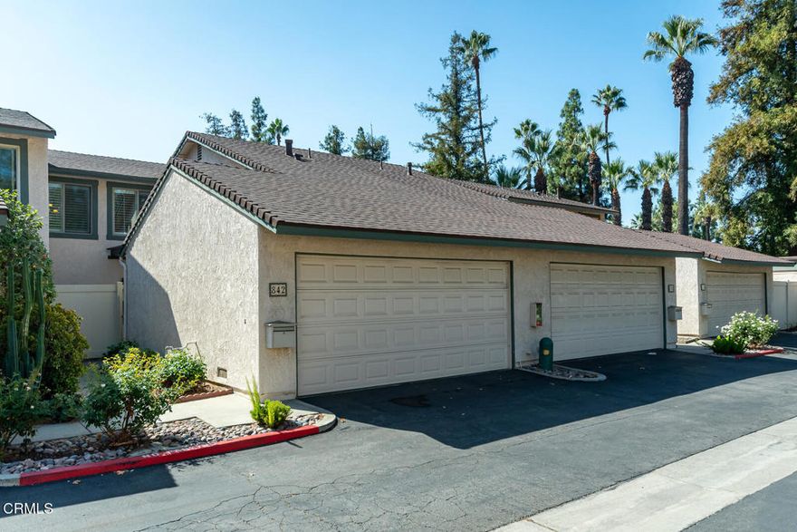 Welcome to 842 Pepper Tree Lane, a rare four-bedroom townhome-style condo offering the perfect combination of space, comfort, and convenience. The thoughtful floor plan features a bright and spacious living room and formal dining area, highlighted by two large sliding glass doors that fill the space with natural light and open to a generous, relaxing back patio. A main level bedroom offers versatility, perfect for guests or a comfortable home office.  Upstairs, you'll find the spacious primary suite, two additional bedrooms, and a versatile bonus room, perfect for a study, office, or even a dream walk-in closet.  Located in the beautifully maintained and sought after Sierra Palms community, one of Azusa's most convenient locations, just a few minutes from Azusa Pacific University, Citrus College, and the Metro Gold Line Station for easy commuting to Pasadena and Downtown Los Angeles.  The home has been tastefully upgraded with a remodeled kitchen featuring granite countertops, a stylish tile backsplash, and stainless-steel appliances. Elegant wood and vinyl plank flooring run throughout, complemented by crown moldings, recessed lighting, double pane windows and doors and custom closet organizers.  Residents of the desirable Sierra Palms community enjoy resort style amenities, including a sparkling swimming pool, basketball court, barbecue area, and plenty of guest parking.