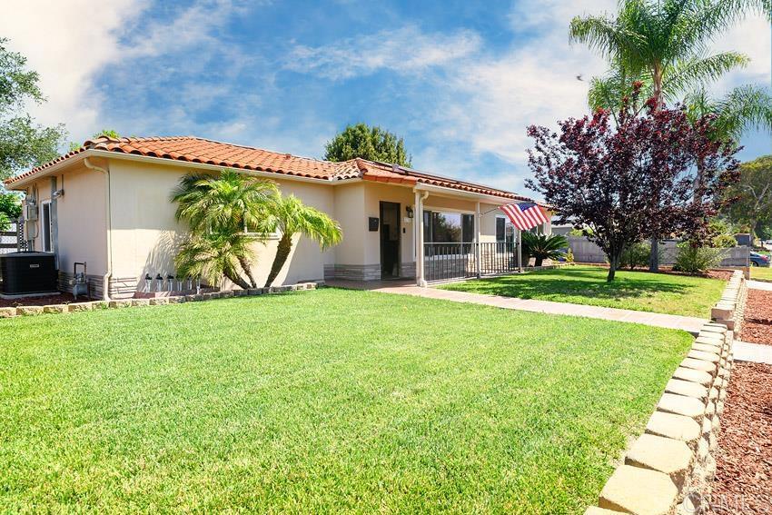 Spacious & versatile Fletcher Hills home with Detached Studio ADU, Paid Solar, and RV/Boat Parking! Discover the perfect blend of comfort, flexibility, and long-term value in this beautifully upgraded 4 bedroom, 2 bathroom home in desirable Fletcher Hills. Set on a generous 0.27-acre lot, the property includes a fully detached and upgraded studio ADU. With a 2.5 car garage, paid solar, dual pane windows, and bonus washer/dryer hook ups on the patio that can be used for a level 2 EV charging outlet, this home is as practical as it is future-ready. Inside, you’ll find a bright, open floor plan centered around a modern entertainer’s kitchen with custom cabinetry, modern appliances, and a large island for gathering. The backyard is a true retreat, featuring a covered patio for outdoor dining, a Cal Spa Swim Pro spa for year-round exercise and relaxation, fruit trees, and ample space to garden, play, or expand. Located in a quiet neighborhood, you’re just minutes from schools, local parks like La Mesita and Harry Griffen, scenic hiking at Cowles Mountain, and convenient shopping and dining. This home truly checks all the boxes! Don’t miss this rare opportunity to own a move-in-ready property with income potential and room to grow. Schedule your private showing today!