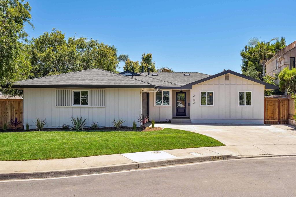 Welcome to this beautifully remodeled 3-bedroom, 2-bathroom single-story home, thoughtfully crafted with a blend of comfort, functionality, and timeless style. Every detail has been carefully curated, from the open-concept layout to the cohesive finishes that create a warm and elevated atmosphere throughout. Step inside to a bright, airy living space that flows effortlessly into the dining area and kitchen—perfect for both entertaining and everyday living. The kitchen showcases an oversized island, sleek white oak cabinets, top-of-the-line appliances, a 6-burner stove, and a striking gold-toned pot filler—all brought together with designer-inspired finishes that add both beauty and function. The spacious primary suite offers a peaceful retreat, and the ensuite bathroom features a thoughtfully planned layout that maximizes space and comfort. Highlights include warm walnut-colored cabinetry, a mix of gold and chrome toned finishes, and a large shower with a built-in bench and oversized niche—blending practicality with spa-like touches. Two additional bedrooms are filled with natural light and provide flexibility for guests, a home office, or a playroom. The shared hallway bathroom has also been beautifully updated, continuing the home’s refined aesthetic and attention to detail. Outside, enjoy a landscaped backyard with a manicured lawn and a large patio—ideal for al fresco dining, weekend barbecues, or simply relaxing in the sun. Situated in a quiet, desirable neighborhood near top-rated schools, parks, and shopping, with easy access to major freeways. Located just minutes from Tecolote Canyon, residents can take advantage of nearby hiking trails and serene natural surroundings. The home is also in close proximity to the University of San Diego (USD) and just a short drive to Mission Bay and Fiesta Island, perfect for outdoor recreation and waterfront activities. Meticulously upgraded—this home blends thoughtful design with everyday livability. Come experience how effortlessly it fits your lifestyle!