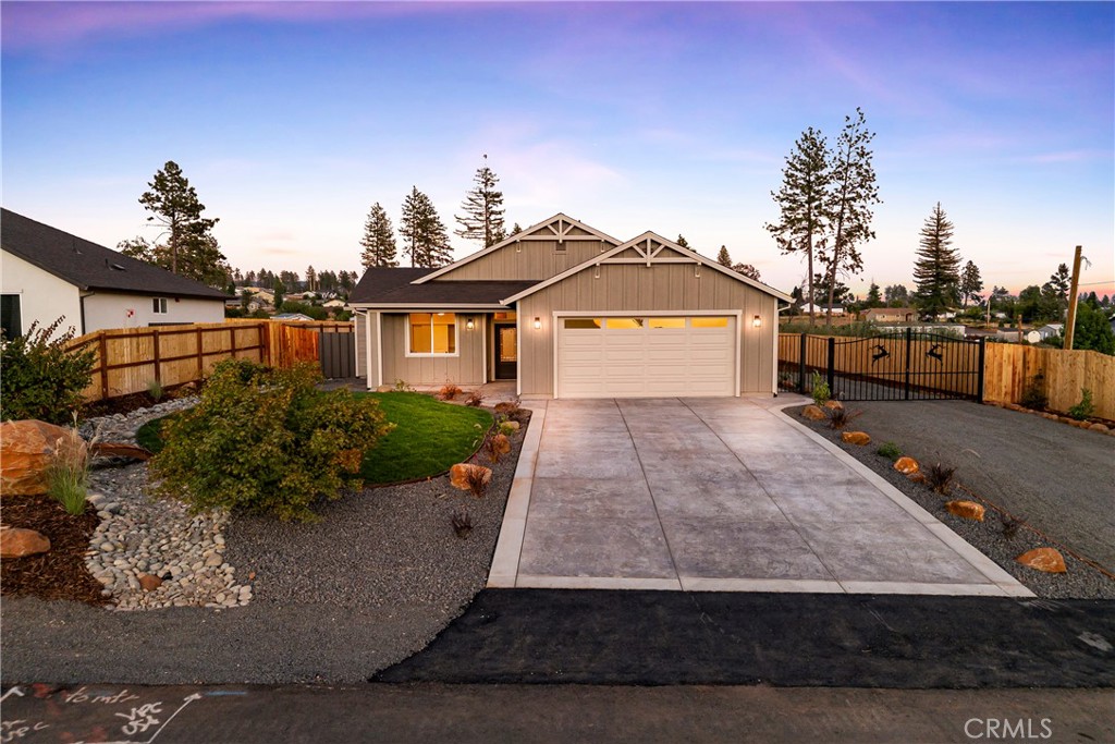 Welcome to Paradise! Location, Design & Quality! With Paid OFF Solar. You wont want to miss this beautiful open layout, park setting home. Its one of a kind, home is perched back. Located in the middle of town. With every detail thought out. You wont want to miss this one! Full 3 bedroom, 2 bathrooms. Fully landscaped front and backyard, fully fenced, and extra wide custom metal RV access gate. Stamped concrete. Lots of attention paid to details. As you walk inside you will be amazed. Custom design elements with a open floor plan. With 9ft ceilings. And living room taking heights to another level, with natural wood beams. Large Kitchen, Quartz Counters, Soft Closing Cabinet Doors. Stainless steel appliances. Tiled fireplace in living room. Lots of windows for more natural lighting. Primary bedroom has custom glass shower doors. Living room and all rooms have ceiling fans. This one has to many upgrades to list. Come see it for yourself. Wont last long!