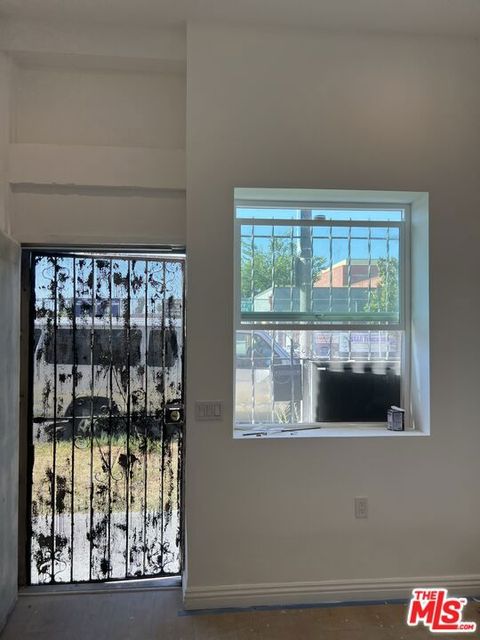 Photo of 1009 46TH W Vermont Avenue, Los Angeles, CA 90037 (MLS # 25582793)
