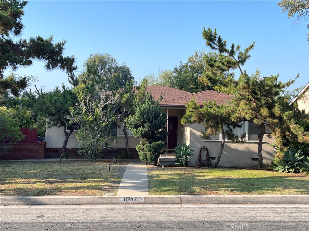 Welcome to this delightful 3-bedroom, 2-bathroom (1 full and 3/4) residence nestled in the sought-after North San Gabriel neighborhood. This inviting single-story home offers a thoughtfully designed floor plan with a spacious living room adorned with elegant crown molding and a decorative fireplace. Formal dining room overlooking the front yard is ideal for entertaining guests. Updated kitchen features rich maple cabinetry, recessed lighting, a 5-burner gas stove, sunny breakfast nook and a side door to the yards.
Generously sized bedrooms and a beautifully remodeled hallway bathroom. Versatile den has been used as a third bedroom. Other features are gleaming hardwood floors throughout, central air conditioning and heating for year-round comfort, detached 2-car garage with automatic door opener and laundry area with sink located in the garage. A covered lanai provides a shaded retreat for relaxing or entertaining.
Step outside to a spacious backyard filled with mature fruit trees including mulberries, persimmons, lemons and oranges—your own private orchard! Enjoy the convenience of nearby metro bus stops, supermarkets, and everyday essentials—all just minutes away.