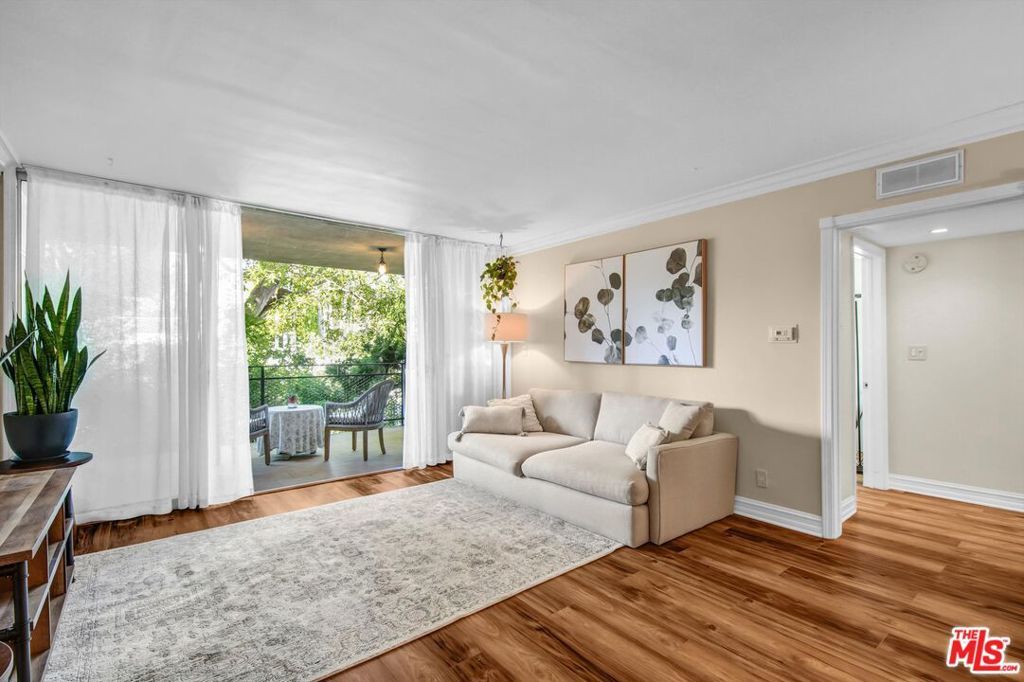 Photo of 289 S Barrington Avenue #A102, Los Angeles, CA 90049 (MLS # 26657481)