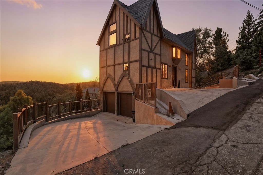 Do you want the coolest home in Lake Arrowhead? Welcome to your mountain castle—an extraordinary retreat where creativity, luxury, and drama collide. With jaw-dropping views that stretch all the way to Snow Valley, this home was built to impress and designed to inspire. Offering three bedrooms, three baths, and a two-car garage, it combines the timeless allure of medieval architecture with the comfort of newer construction.
Inside, every detail tells a story. The interiors, curated by HGTV designer Matthew Finlason, are bold, artistic, and unforgettable—perfectly blending castle-like mystery with modern sophistication. This is not your typical mountain home; it’s a statement, a stage, and a setting for unforgettable gatherings.
Located near the prestigious Lake Arrowhead Country Club and offering full lake rights, it’s the ideal escape for Hollywood creatives, Los Angeles weekenders, or anyone searching for something beyond the ordinary. Whether hosting glittering parties or simply savoring the mountain air from your balcony, this home delivers a lifestyle as rare as its design.
26635 Amador Lane isn’t just a house—it’s an experience waiting to be lived.