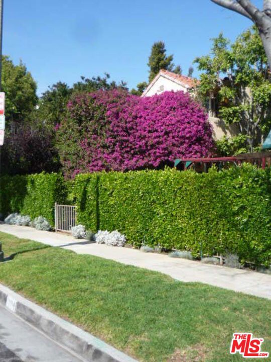 Restored with major detailed work, this charming, boutique 4-unit complex is quietly tucked away in the heart of Beverly Hills, offering a secluded and peaceful living experience surrounded by lush greenery. Ideally located just a short distance from Rodeo Drive, one block east of Beverly Drive, and two blocks south of Wilshire Boulevard, this bright and airy unit is situated on the 2nd floor, providing privacy and tranquility.This roomy, updated 1-bedroom, 1-bath features a great layout with beautiful hardwood floors, large windows, and an abundance of natural light throughout. The kitchen boasts custom cabinets, granite countertops, and includes a dishwasher, microwave, and gas stove. There's also ample closet space and an in-unit washer/dryer for your convenience.The designer bathroom seamlessly blends modern upgrades with the building's original character, creating a timeless yet refreshed ambiance. The gated building is situated in a quiet, highly walkable neighborhood, close to Beverly Vista Middle School, and an array of local shops and restaurants as well as close to the new Metro station. Available for immediate occupancy.