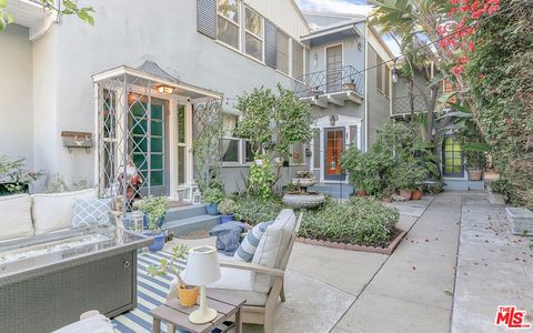 Photo of 1125 1/2 Glenville Drive, Los Angeles, CA 90035 (MLS # 25597809)