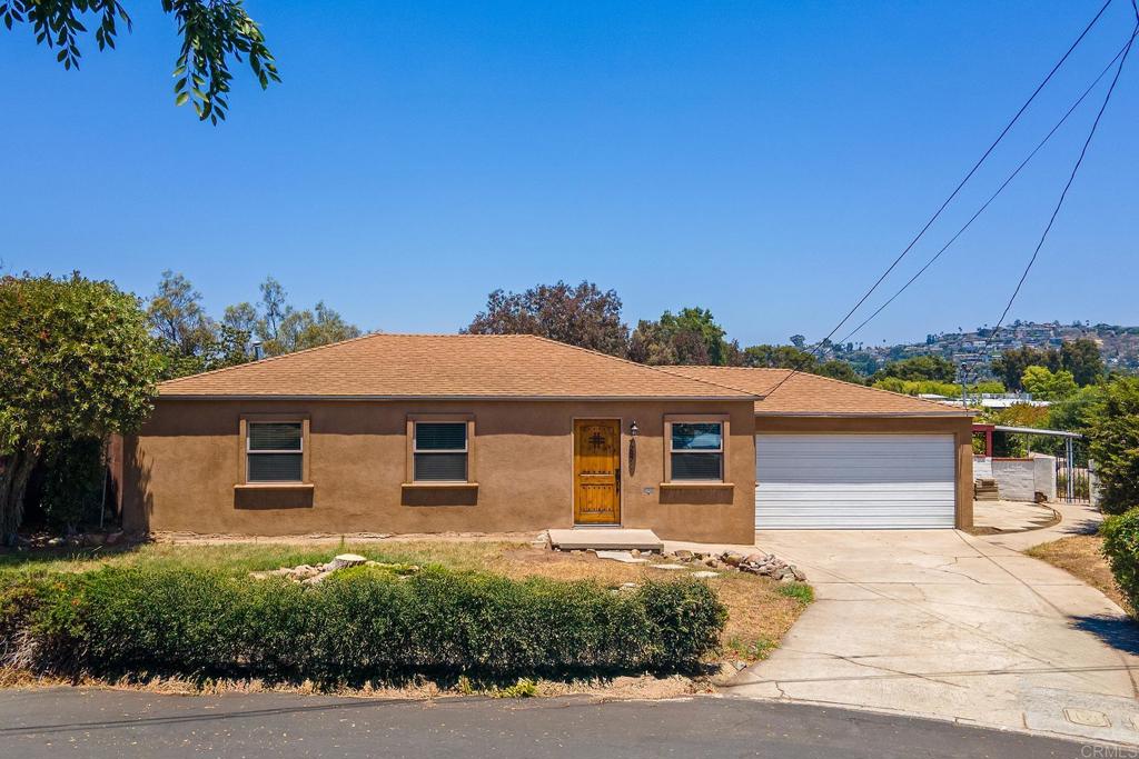 Welcome to 7287 Blackton Drive, nestled in the heart of La Mesa’s desirable Vista La Mesa neighborhood. This 3-bedroom, 1.5-bath traditional home offers over 1,050 square feet of comfortable living on a rare and expansive 0.53-acre lot. The updated kitchen features warm maple cabinetry, granite countertops, and stainless steel appliances. Hardwood flooring flows throughout, creating a clean and timeless feel. Outside, enjoy an expansive backyard, perfect for entertaining with a large covered patio, built-in fireplace, and easterly views that add to the tranquil atmosphere. The 2-car attached garage, quiet cul-de-sac location, and proximity to Helix High School make this a smart choice for tenants seeking a strong school district. Whether you’re a homeowner or investor, this is a fantastic opportunity to own a spacious property with room to grow in one of La Mesa’s most convenient and established communities.