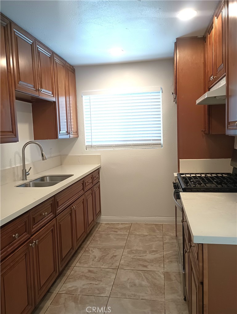This is a two-bedroom, one bath, second floor apartment in Pomona, CA. It is recently renovated. It has a one shared car garage, and an onsite-coin laundry machine. It is available for rent now