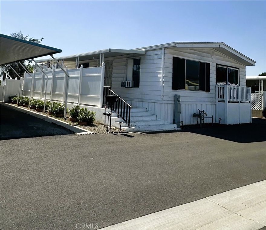 Spacious 2-Bedroom Home in Renovated Senior Community – Mountain Views Included!

Welcome to your new home in the beautifully upgraded California Mobile Home Park, a premier 55+ community now under new ownership! This serene park has been thoughtfully revitalized with freshly paved roads, a replastered swimming pool, a remodeled clubhouse, and expert on-site management—creating an ideal setting for relaxed and carefree living.

Step inside this extremely spacious 2-bedroom, 2-bath home boasting over 1,400 square feet of comfort and style. The airy vaulted ceilings create an open and inviting atmosphere throughout the living room, family room, and formal dining area, perfect for entertaining guests or enjoying quiet evenings at home.

The updated galley kitchen features crisp white appliances—including a stove, refrigerator, and built in oven—along with a convenient sit-down bar for casual meals. A separate laundry room adds practicality, while the new, oversized HVAC system ensures year-round comfort.

Retreat to the generously sized master suite complete with a walk-in closet, double sinks, a vanity area, and a private water closet with shower. The guest bedroom is equally spacious and enhanced with mirrored closet doors, adjacent to a beautifully remodeled guest bath featuring a modern, tiled shower.

Wow also enjoy this home with brand new carpet and a new roof.  

Enjoy your morning coffee or evening breeze from the large porch or balcony with stunning mountain views. The home also includes a covered carport for added convenience and brand new carpet throughout for a fresh, move-in-ready feel.

Don’t miss your chance to live in this vibrant and welcoming senior community—schedule your private tour today!
