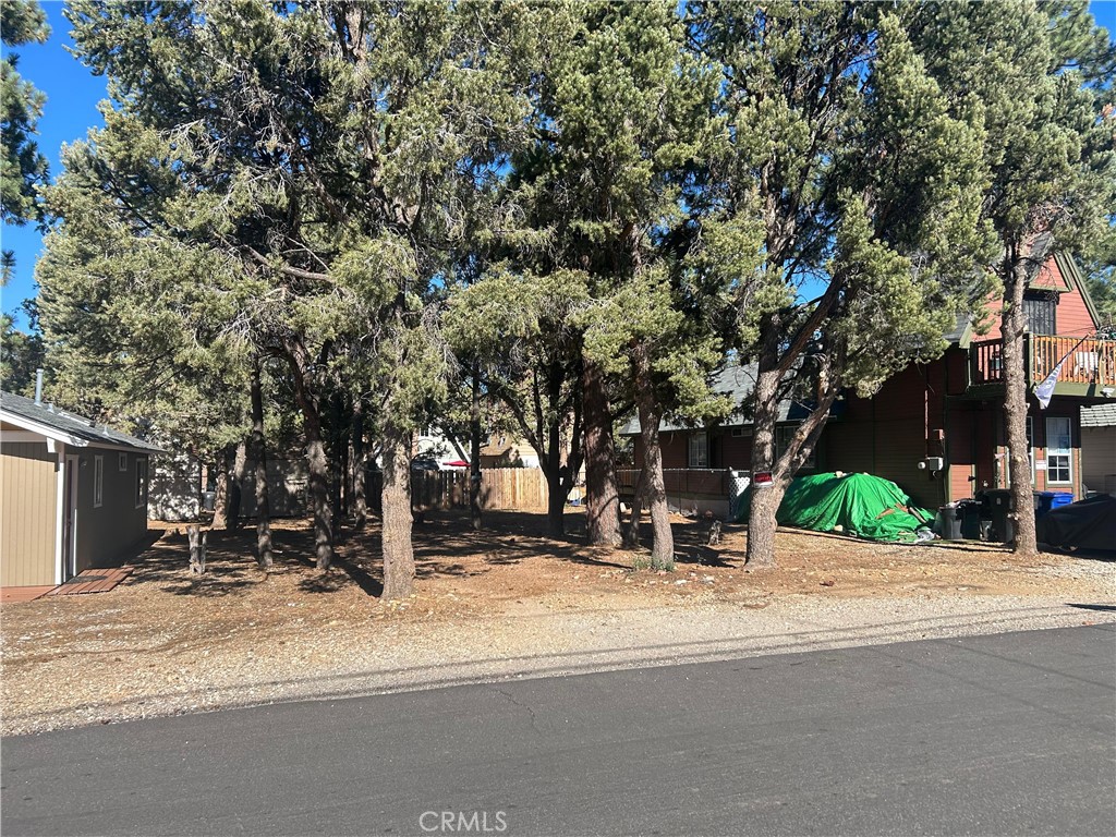 Two adjoining lots for sale in the peaceful Sugarloaf community of Big Bear, offered together under APN 2350492060000. Just a block from Big Bear High School, this location offers the perfect blend of convenience and mountain charm. Enjoy being minutes from Big Bear Boulevard and Highway 38, with easy access to Bear Mountain and Snow Summit ski resorts, Big Bear Lake, and endless hiking trails in the San Bernardino National Forest. The neighborhood features a friendly small-town atmosphere with a post office, convenience store, local restaurant, and laundromat nearby. Families will appreciate the proximity to schools, parks, and a fire station, while outdoor enthusiasts can take advantage of year-round recreation from skiing and snowboarding in winter to fishing, boating, and hiking in summer. Whether you dream of building a cozy mountain cabin, a spacious retreat, or an investment property, these two combined parcels provide a rare opportunity in one of Big Bear’s most inviting communities.