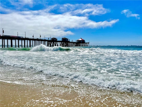 Photo of 7535 Quiet Cove CIR, Huntington Beach, CA 92648 (MLS # TR26114056)