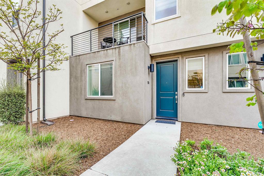 Welcome to 5261 Beachfront Cove, where comfort, style, and smart living come together in one of South San Diego’s most up-and-coming communities. This tri-level townhome in Playa Del Sol offers 4 bedrooms, 3.5 bathrooms, and just under 1,800 square feet of thoughtfully designed living space. From the moment you walk in, you’ll notice the fresh designer paint, upgraded lighting, and a stunning geometric accent wall that adds a bold, modern touch. These aren’t just cosmetic updates; they’re premium design features that elevate the home’s overall feel.The first level includes a private bedroom with its own full bath, ideal for guests, roommates, or a quiet home office setup. Upstairs, the main living area feels open and bright. The modern kitchen is equipped with stainless steel appliances, sleek counters, and smart home upgrades like Alexa integration and WiFi-controlled AC and heating. Whether you’re hosting or winding down, this space blends functionality with style. The primary suite features dual closets (his and hers) and a spacious bathroom with dual sinks, so sharing space is no issue. The benefits extend beyond the home. Playa Del Sol offers a gated community with resort-style amenities including a pool, heated jacuzzi, gym, clubhouse, and playground. Whether you want to unwind or stay active, everything you need is right here. Located in Otay Mesa, you’re close to parks, shopping, dining, and just minutes from the freeway, keeping everything within easy reach. If you’ve been looking for something turnkey, modern, low maintenance, and full of thoughtful upgrades, this is it. Let’s schedule your private tour today.
