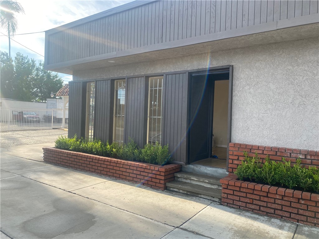 Great location. Concrete and gated yard. Full bath with shower. large with roll up door, new roof, paint and windows. Large show room and office. Could be live in user space. Must see.