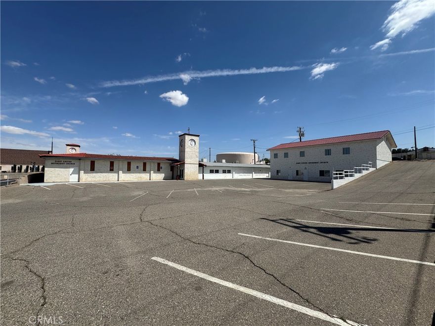 PRIME SIGNALIZED CORNER LOCATION!! 1.86 about 2 acres of prime commercial property!! Located In The Heart Of the City: right across from Barstow DMV, and right next to CHP Office, City of Barstow, Superior Court of San Bernardino, and Barstow High School. Subject property is the First United Methodist Mission Church Of Barstow. Site Has A Flexible Building Layout And A Great Opportunity For A Religious Organization, School, Medical Office, Non Profit, convert to an apartment complex or explore your own vision and development plan!! Approximately 16,614 Square Feet Of Building Space. Sanctuary Seats Over 250 plus, Multi Purpose Rooms, 2 Story Building With Classrooms, 2 Social/Fellowship Halls, Kitchen, Administration Offices, Conference Room & more. There Is A Building At The Top Of The Driveway, That Is Currently Being Rented By The City, And Being Used As a Thrift Store. HUGE Asphalt Parking Lot front and back, can park 100s of cars. MOTVATED SELLERS!!