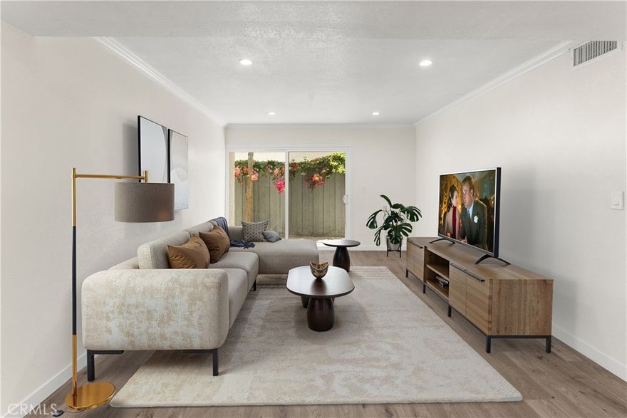 Beautiful, recently renovated condo with townhouse feel! This condo is an open-floor plan living room to kitchen with quartz countertops new laminate floors. All rooms are very spacious with master bedroom that includes walk-in closet and private bathroom. Cozy backyard and nearby parking that is rare for common condos. Great location in the heart of Tarzana with a ton of amenities.