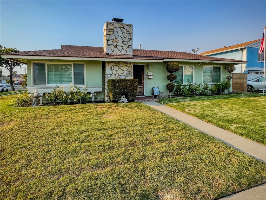 Discover comfort, function, and style in this beautifully maintained corner-lot single-family residence, located on a quiet cul-de-sac in the desirable Westmont neighborhood of Fountain Valley. This 3-bedroom, 2-bathroom home offers approximately 1,398 square feet of thoughtfully designed living space, situated on a spacious 7,840 square foot lot that provides additional privacy, yard space, and curb appeal.
Inside, you’ll find a welcoming living room featuring a cozy fireplace, perfect for gatherings or quiet evenings. The remodeled kitchen showcases granite countertops and updated cabinetry. A designated dining area includes a breakfast nook that opens to the backyard patio, creating a seamless indoor-outdoor flow for everyday living or entertaining.
Both bathrooms have been tastefully updated with modern finishes, and the home features a blend of laminate and carpet flooring throughout. Recent upgrades include newer vinyl windows and doors, enhancing natural light and energy efficiency. Additional interior highlights include forced air gas heating, attic storage, and overall thoughtful updates throughout the home.
The stucco exterior is complemented by a shingle roof, overhang gutters, and mature landscaping. Enjoy the convenience of an attached 2-car garage, a 2-car driveway, and additional RV parking—a rare find in this neighborhood. The corner lot not only adds visual prominence but also offers potential for future outdoor enhancements.
Situated in a well-kept suburban community bordered by Edinger Avenue to the north, Harbor Boulevard to the east, Ellis Avenue to the south, and Beach Boulevard to the west, this location provides easy access to shopping, dining, parks, and commuter routes. The property shows no signs of deferred maintenance and is in good overall condition, making it truly move-in ready.
This is a rare opportunity to own an updated home on a large corner lot in one of Fountain Valley’s most established and welcoming neighborhoods.
