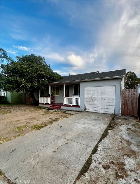 Photo of 1328 W Arbutus St, Compton, CA 90220 (MLS # DW25278190)