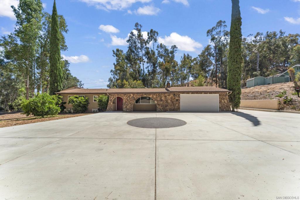 Welcome to 3007 Quail Rd, a beautifully refreshed 3-bedroom, 2-bathroom home offering 1,500 sq. ft. of comfortable living space in a desirable Escondido neighborhood. Recent updates include brand new flooring and fresh interior paint throughout, new windows, giving the home a light, bright, and move-in ready feel. The spacious living room is filled with natural light with a stone fireplace and flows seamlessly into the dining area, creating the perfect setting for gatherings and everyday living. The kitchen offers ample cabinet storage and counter space, making meal preparation both convenient and enjoyable. The primary suite features its own private bathroom, while two additional bedrooms provide versatility for family, guests, or a home office. Both bathrooms are well-appointed and ready for your personal touch. Step outside to a private backyard that’s ideal for outdoor dining, gardening, or simply relaxing. An attached oversized garage and driveway provide convenient parking and storage options. Located near schools, shopping, dining, and with easy freeway access, this home combines comfort, style, and practicality. With its fresh updates and functional layout, 3007 Quail Rd is the perfect opportunity to enjoy North County living. Country living at it's best, but located just outside the city limits.