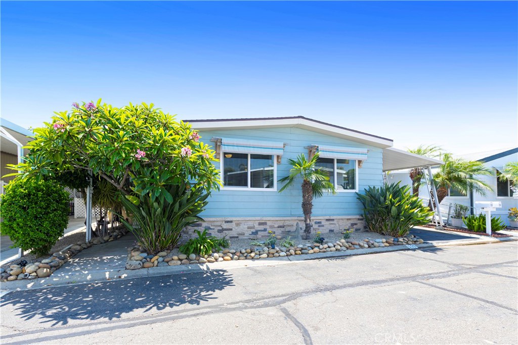 Spacious 2BR/2BA + office/3rd BR in desirable 55+ community near downtown San Juan Capistrano & Doheny Beach. Remodeled master & guest baths, updated kitchen w/new cabinets, counters, backsplash, and extended breakfast bar. New laminate wood flooring, ceiling fans, and screened front porch w/café lighting. Private backyard oasis with orange & lemon trees, roses, plumeria, bird of paradise, perennials, succulents, water fountain, and gate to scenic San Juan Hills & community amenities. New 30-yr roof, 2025 HVAC, newer water heater, electric panel, energy-efficient windows, smart thermostat. Seasonal trolley stop at community entrance to SJC, Dana Point, & Laguna Beach. Pet-friendly park w/clubhouse, pool, jacuzzi, putting green & more!