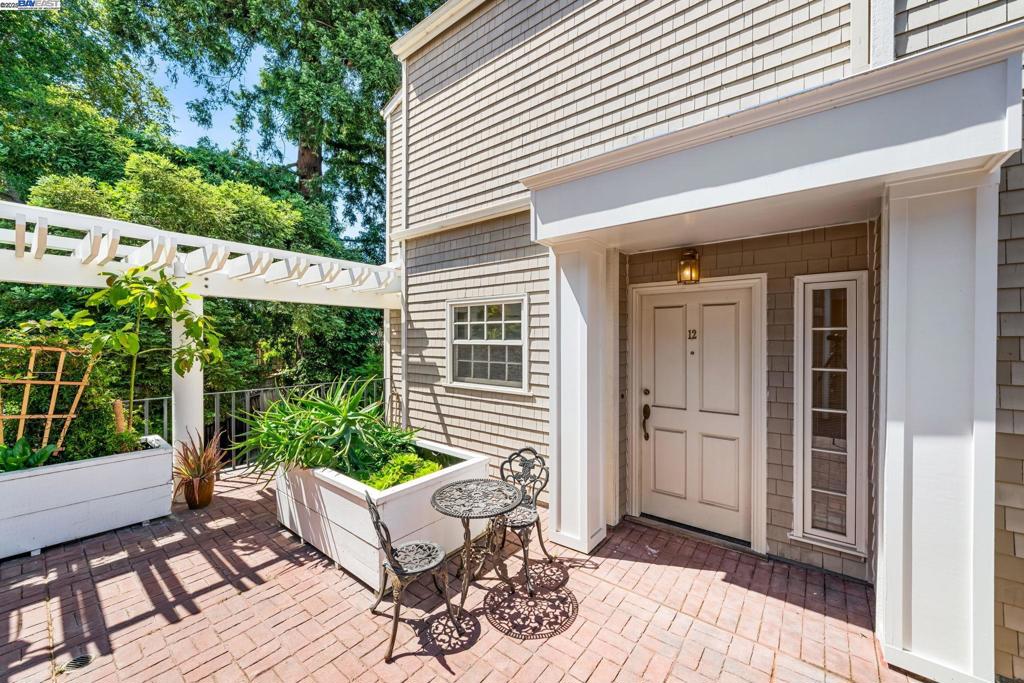 First time on the market! Tucked away on a quiet, tree-lined street in the heart of The City of Good Living, this beautifully designed, end-unit condo offers the privacy of a townhouse with the ease of condo living. Nestled in a serene setting with peaceful views of a lush redwood garden, this home is a rare find. Inside, enjoy a spacious open layout with abundant natural light, dual primary bedrooms—each with en-suite bathrooms—and a thoughtfully placed half bath for guests on the first floor. Whether you're working from home or entertaining, the flow and functionality are unmatched. Additional features include two secure garage parking spaces, in-unit laundry, and your own personal storage unit. Located just a short walk from downtown shops, restaurants, and the local farmers' market, this home blends tranquility with urban accessibility. Close to the San Carlos Library, top-rated schools, Highway 101 & the Caltrain station, you'll have everything at your fingertips. Come experience the perfect balance of nature, privacy, and city living.