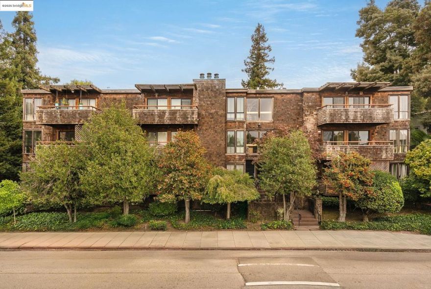 Welcome to 742 Wesley Way - Oakland living at its finest!  This sought-after boutique condo was built in 1981 with just 15 units. It's centrally located - a short stroll to landmarks like Lake Merritt and the Grand Lake Theater, plus amenities and retail galore along main avenues Lakeshore and Grand.   #2C is a spacious 912 square foot 1-bedroom, 1-bathroom with treehouse vibes. A retreat from city life, the floor-to-ceiling windows and large balcony invite the outside in; the perfect setting to enjoy and relax in privacy.   The unit's warm, contemporary design features a fireplace and accent walls, tile and light fixtures. Tasteful, quality finishes make the kitchen and bathroom stand out aesthetically, while in-unit laundry, below-ground parking and additional storage highlight convenience.   *97 walk score, local and transbay buses nearby, Trader Joe's across the street, as well as the weekly farmer's market!