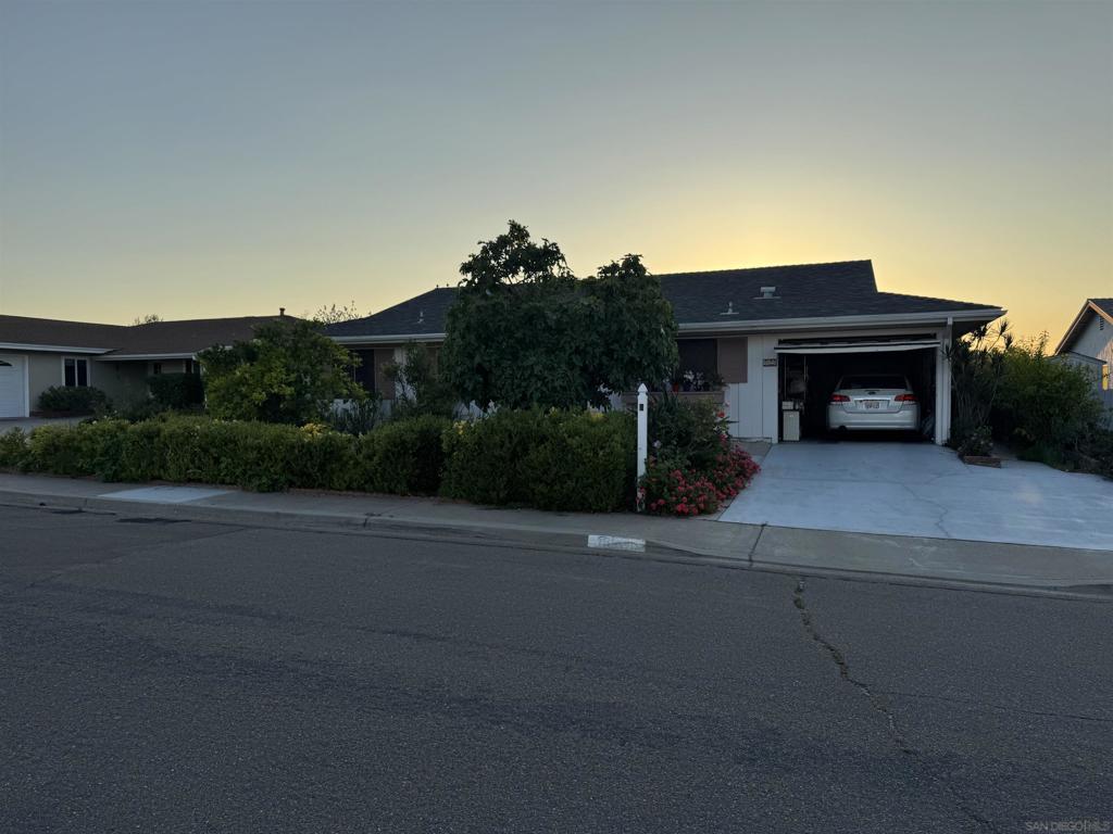 55+ Senior area in Rancho Bernardo, one of the nicest streets with a view to the west from the backyard, Tile floors in both bathrooms, laundry room adjoins extra room ! sq. ft per assessor's record!