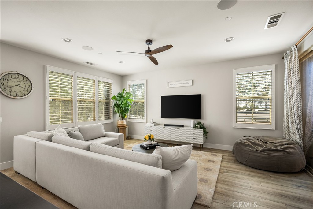 Welcome to this highly upgraded and impeccably maintained condo offering the perfect blend of style, space, and functionality. No expense spared with designer finishes, gorgeous LVP flooring (no carpet anywhere), shiplap paneling... Nestled on a secluded street in highly sought after Portola Springs close to award-winning schools, parks, shopping, and dining, this home is ideal for those seeking convenience without compromising on comfort or quality. Step inside to discover a thoughtfully designed floor plan that maximizes natural light and modern living. Private first floor bed/bath leads upstairs to main level featuring open-concept kitchen/dining/living area. A versatile bonus room on the 2nd level provides the perfect space for a home office, playroom, den/flex space. Elegant finishes, recessed lighting, and luxury flooring throughout. Designer upgrades with quartz countertops, stainless steel appliances, custom lighting and window treatments. Spacious 3rd floor bedrooms offer 3 peaceful retreats, including a luxurious primary suite with a spa-like en-suite bath and ample custom closet space. Additional highlights include an attached two-car garage with Tesla wall charger, smart home features, energy-efficient upgrades, and access to community amenities. This is a rare opportunity to lease a move-in-ready, tri-level home in a vibrant neighborhood with top-rated schools just minutes away.