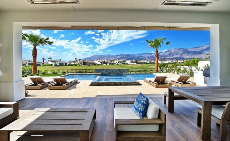 Welcome to effortless elegance and modern desert charm in this beautifully furnished 2023 Spanish Transitional Plan 301, ideally situated on the 11th fairway of the renowned Rees Jones course at Andalusia Country Club. Offering 3,333 sq. ft. of refined living space and stunning south-facing views of the Santa Rosa Mountains, this home delivers a perfect blend of style, comfort, and sophistication.Inside, clean architectural lines and high-end finishes define the open-concept layout. The great room features disappearing sliding glass doors that create a seamless transition to the covered patio and private interior courtyard--perfect for relaxed indoor-outdoor living. The gourmet kitchen is both sleek and functional, appointed with premium appliances and custom cabinetry, designed to suit both everyday living and entertaining.The primary suite offers a tranquil retreat with a spa-like bathroom including a freestanding soaking tub, walk-in shower, and generous storage. A separate guest casita with its own entrance provides flexible space for visitors, a home office, or creative studio.The backyard is an inviting escape, complete with a custom pool and spa framed by sweeping golf course and mountain views. Whether entertaining or unwinding, this home captures the essence of luxurious desert living.Turnkey furnished per inventory, this is a rare opportunity to own a thoughtfully designed, move-in-ready home in one of the Coachella Valley's most sought-after private communities.
