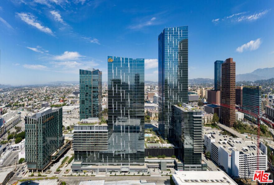 THEA the divine radiance of Downtown Los Angeles. A goddess of light and luxury from atop 59-towering stories, our Downtown Los Angeles residences for rent shine over the stunning downtown landscape. THEAs impeccable collection of studio, one, two, and three-bedroom as well as penthouse. *The interiors are highlighted by a rich variety of natural materials, including stone combinations, solid woods, and contemporary metal finishes. Each light-filled residence is draped in floor-to-ceiling windows showcasing the skyline of downtown Los Angeles and wide cityscapes. Upper levels provide unprecedented, panoramic views of DTLA and beyond. Life at THEA provides the next level of DTLA luxury, combining remarkably designed interiors, epic views, white-glove services, Generous ceiling heights at 9 and up to 12, depending on the floor, European custom-designed cabinetry with soft-closing hardware throughout, Solid core wood doors, Hardwood floors, Stone counter tops and back splash, Beautifully detailed chef kitchens with high-end European appliances, Kitchen islands available in select units, Spacious bathrooms with 6 soaking tub, Gas ranges with cast iron grates, Built-in wine cooler, Full width mirrors in bathroom, In-unit 24 washer and dryer, Keyless entry system. *Unparalleled amenities to redefine the finest quality of the DTLA live-work-play lifestyle With over 1.5 acres of outdoor space to relax and entertain including downtowns largest pool and a private sky lounge, our Downtown Los Angeles residences define the height of luxury. Clubhouse with social lounge and chef kitchen, 25-meter resort-style heated pool with spa and cabanas Pavilion with catering kitchen, Rooftop, dog park, Kids playground, Professional fitness center, Yoga studio, Billiard, theater and game rooms, Business center, *LEVEL 27 AMENITIES INCLUDE: Sky lounge with full catering kitchen, Indoor/outdoor gathering spaces Rooftop fire pit, Outdoor barbeque area with lounge. One of the trendiest neighborhoods in Los Angeles, South Park offers world-class entertainment, funky murals, fantastic shopping and dining, and unmatched culture. This is where you'll find some of LA's favorite destinations, including LA Live, a vast entertainment venue that includes the Grammy Museum and Microsoft Theater, as well as the Staple Center and the Los Angeles Convention Center. If you want to live in South Park, this neighborhood begins along West 8th Street and extends to I-10. The Harbor Freeway is along the northern end, while South Main Street is along the southern end. South Park is adjacent to Downtown LA, with the Fashion District to the southeast. University Park, home to the University of Southern California, is on the south side, while the popular Pico-Union neighborhood is to the west. "Elevate your living experience to newer heights at THEA. Meet her for yourself.."