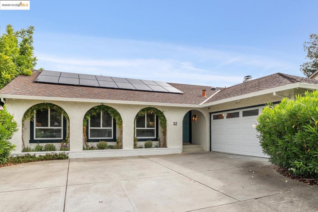 Is it possible to have a significant sized property, with privacy, gorgeous views, the best schools, access to exclusive country clubs, and close to everything you love to do at a reasonable price? 32 Pacer says YES. Nestled at the end of a cul-de-sac deep within the Livorna community, this home is all ready for you to move in and enjoy the best weather of the year. With a great single level layout, new hardwood floors, new HVAC complimented by solar panels, and refreshed bathrooms and kitchen, you will find time at home relaxing and love having your friends over. The private rear of the home is surrounded by an oversized entertaining deck that gives way to a huge newly fenced yard where your family will thrive adventure style. The rear garden features a free standing air conditioned cottage with its own deck for relaxing in between zooms or cooling off after a secluded workout as well as a treehouse hideaway with swings and slides for the kids. The neighborhood shines too, with access available to the Livorna Swim Club, proximity to exclusive Round Hill Country Club, scenic trails like Shell Ridge, and top-rated Alamo Elementary. Downtown Walnut Creek, Alamo, and Danville are all just minutes away— lifestyle, location and value meet here beautifully.