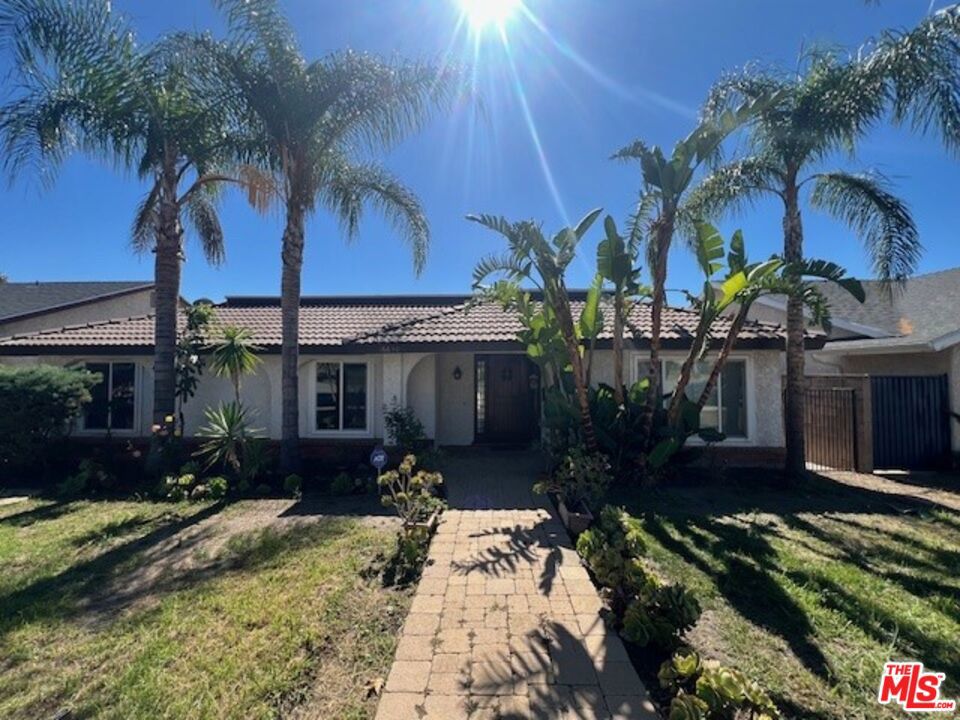 Step into this spacious and elegant 4-bedroom, 2.5-bathroom home (approx. 2,220 sq. ft) tucked away on a generous lot in Granada Hills. From the moment you arrive, you'll appreciate the classic style and thoughtful layout. This home features a large living area, multiple gathering spaces, and plenty of room for everyone to spread out. Inside, you'll find spacious living and dining areas filled with natural light, recessed lighting throughout, and numerous gathering spaces designed for today's lifestyle. The large kitchen features ample cabinetry and counter space, and multiple dining areas ideal for both everyday meals and entertaining. Each bedroom is generously sized, while the bathrooms are thoughtfully designed to balance style and functionality. This lot is split and includes a separate ADU in the back, but both residences have their own private entrance with multiple off street assigned parking spaces. This front house also enjoys its own private outdoor backyard space, perfect for relaxing or entertaining. There is also ample street parking for guests. Located just minutes from local shops, dining, parks, easy freeway access, and excellent schools, this home offers the perfect blend of luxury and everyday convenience. Don't miss your chance to lease this rare gem in one of Granada Hills' most desirable neighborhoods, schedule your private showing today!
