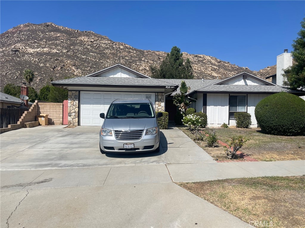 This single story 5 bedroom 2 bathroom in the quiet area. This house can be 4 bedroom with office or 5 bedroom, enter in to big opened living room with tile floor and fireplace, Kitchen with white tile countertops, separate cooktop and stove, house comes with refrigerator, square dining table with 4 chairs. All bedrooms are wood floor, 1 master suite and hallway bathroom, office/5th bedroom in the center of the house, next to the front door. Attached 2 car garage direct access to the house, washer and Dryer in the garage. Big back yard for BBQ and family gathering.