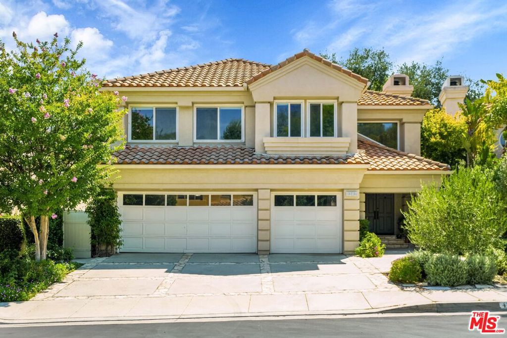 Available immediately at The Bellagio 24 hour Guard Gated Community. Freshly painted through and ready to move into.Enter the light filled 2 story Great room with fireplace and hi ceilings. An open floor plan, ideal for entertaining, flows from the Great room to the Dining room to the Family room with a fireplace. Breakfast area with picture windows and a gourmet Kitchen with Viking refrigerator, double ovens and a center island. Kitchen and the Family room enjoy views of the black bottom infinity pool, spa and majestic oaks beyond. Sliding doors lead to a beautifully landscaped patio area with BBQ and refrigerator. Upstairs is a huge Primary suite with sitting area and fireplace that overlook treetop views.Primary bathroom with spacious tub with picture window facing the yard, large shower, vanity area with double sinks and walk-in closet. 2 additional bedrooms ensuite (both bathroom upgraded) and an enormous bonus room that could be an office, upstairs family room or a fourth bedroom. There is an additional bedroom ensuite downstairs (bathroom upgraded) as well as a powder room and laundry room. This home is walkable to the Lake and the Commons. Easy to show.