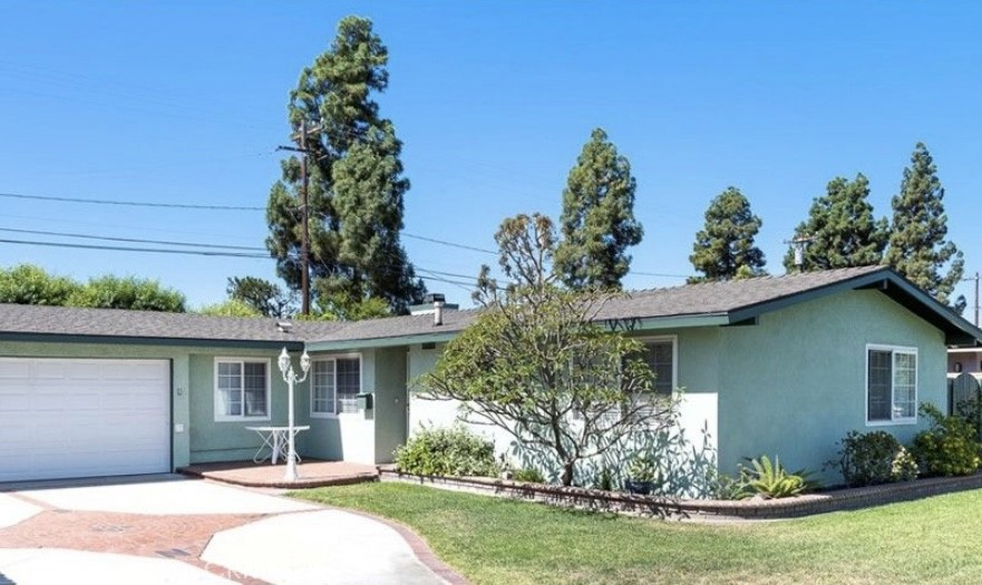 Welcome to your dream home! This beautifully 4 bedrooms and two baths with a huge backyard, perfect for families or those seeking extra space. Step inside to discover a specious living room ideal for entertaining family and friends. The fourth bedroom is a private guest room which can be rented out separately, or use for private office space, making it perfect for remote work. The backyard is huge for entertaining family or friends get together, with a huge patio, long driveway can easily park 4 cars, central air and heating, double pane windows. Perfectly located near downtown Fullerton, great schools, and local new parks, and minutes from freeway. This home is a turnkey opportunity to live in a well-loved neighborhood with timeless appeal. Don't miss the opportunity to call this gorgeous home yours. Schedule your tour today!