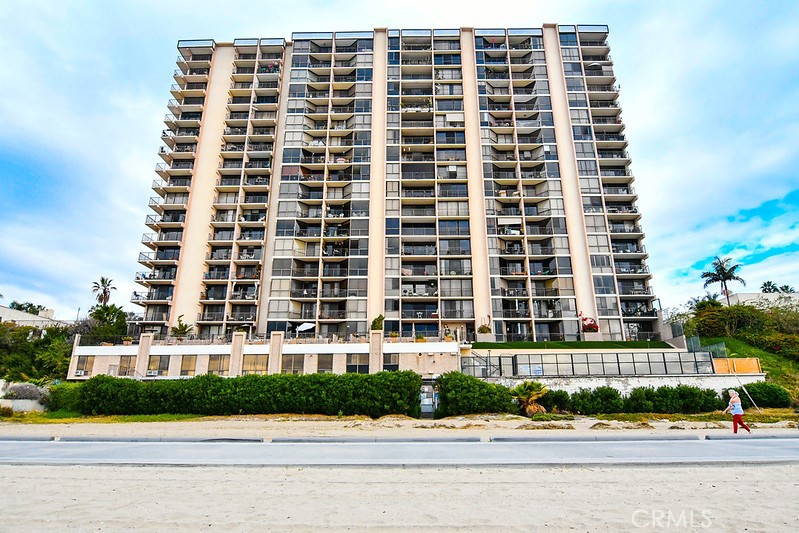 Don’t miss this incredible opportunity to own one of the largest two-bedroom condos in the highly coveted Queens Surf—an oceanfront gem offering unbeatable value and breathtaking panoramic views of the Pacific Ocean, Catalina Island, the Marina, and beyond. From golden sunsets to the sound of waves just outside your window, this home delivers the ultimate Southern California beach lifestyle. Perfectly positioned between vibrant Belmont Shore and downtown Long Beach, you’re steps from the beach, the scenic bike path, and the sand itself. This spacious 2-bedroom, 2-bath unit is mostly original, offering you a fantastic canvas to make your own. The layout is generous, with some of the best views in the building, making every day feel like a vacation. Enjoy resort-style amenities including a beachfront pool and spa, a community lounge with full kitchen, fitness center, sauna, showers, and direct beach access. Two secure parking spaces are conveniently located. On-site management is available to receive packages and ensure a smooth living experience. Explore everything Long Beach has to offer, from the Long Beach Museum of Art and Aquarium of the Pacific to the Queen Mary, Grand Prix, Rainbow Harbor, and dozens of restaurants, shops, and markets. Ocean Boulevard doesn’t get better than this—rarely does a unit with these views and size come to market.