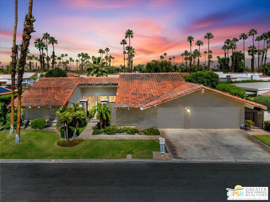Situated in the exclusive gated enclave of Country Club Estates in Rancho Mirage, with a low-density setting boasting just 100 homes, this elegant 3-bedroom, 3-bath residence spans 2,638 sq. ft. on an expansive 10,019 sq. ft. lot. Designed for refined desert living, the home offers a semi-open floor plan that balances flow and privacy with soaring ceilings, a dedicated office or den, and beautifully appointed interiors.The gourmet kitchen is a culinary showcase featuring a Wolf range, premium appliances, and direct access to an inviting outdoor dining space surrounded by citrus trees and mature landscaping. The lush backyard retreat includes a Pebble Tec spa/pool, creating a private oasis ideal for relaxation and entertaining. Additional highlights include 42 solar panels, newer double-pane picture windows, luxury window coverings, Restoration Hardware lighting, and a three-car garage. Residents of Country Club Estates enjoy resort-style amenities including a community pool, spa, tennis, and pickleball courts. The HOA ($546/mo) includes cable, internet, front yard maintenance, concierge trash, and sewer service. Perfectly positioned near El Paseo's renowned shopping and dining and just minutes from Palm Springs, this home offers the very best of Coachella Valley living, style, comfort, and convenience in one exceptional address.