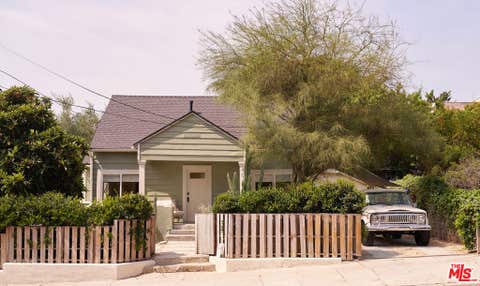 Photo of 404 N Avenue 52 Ave, Los Angeles, CA 90042 (MLS # 26843447)