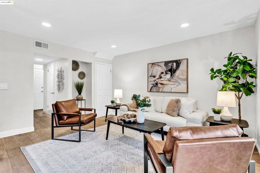 Welcome to your serene retreat in the coveted Skywest community, where tranquility meets convenience. Just minutes from beautiful downtown Walnut Creek, this exceptional townhome offers an unmatched lifestyle experience.  Your journey begins at the charming, fenced entrance patio, providing privacy and a warm welcome. Inside, the renovated kitchen features stunning granite countertops, contemporary cabinetry, and designer lighting, seamlessly connecting to the dining space. Imagine entertaining loved ones on the expansive, lush patio adjacent to the family room—perfect for entertaining or relaxing on warm evenings.  Recently updated with a new HVAC system, energy-efficient dual-pane windows, garage door, and a newer water heater, this home ensures year-round comfort and efficiency.  Upstairs, you’ll find two luxurious bedroom suites, each with private full bathrooms, complemented by a convenient half bathroom on the main floor. The garage laundry setup includes a washer and dryer, while updated flooring throughout the lower level adds elegance and contemporary design.  Enjoy exclusive access to greenbelt spaces, tennis courts, a clubhouse, and a sparkling community pool—perfect for sunny days. This move-in ready gem awaits your personal touch and won't last long!