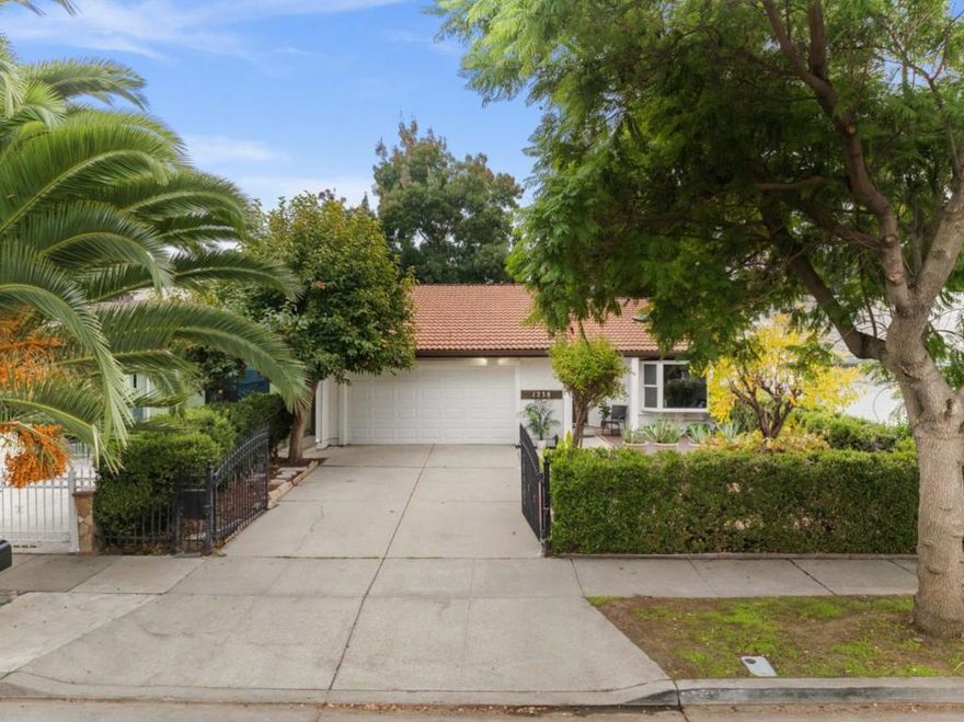 Welcome to this beautiful home in the up and coming Ramble wood neighborhood of San Jose!  Located with easy assess to Hwy 101 and shopping off of Capital Expressway, this charming single-level starter home features three bedrooms, two bathrooms, at 1,239 square feet. The kitchen boasts extensive cabinet space, stainless-steel appliances, granite counter tops and backsplash, new lighting, wave on and off faucet, filter water system and a beautiful large garden window. The bedroom floors have newer luxury vinyl flooring, there are skylights in the living room and bathroom, new mirrored closet doors in the bedroom, walk in closet in the primary bathroom, fresh exterior and interior paint, and a  Additional highlights include an indoor laundry room, attached two-car garage, Auto gates at the driveway, yards, and a private fenced rear yard with fruit trees, ideal for outdoor enjoyment.  Alarm system is installed and can be reinstated.  Skylight in the Living in Bathroom for extra light. This residence is conveniently located close to Schools, park, Target, Sprouts Farmers Market, Eastridge Center, various restaurants, shopping options, and major freeways including 101, 280, and 680. Don't miss the opportunity to make this well-located and beautifully updated home your new haven.